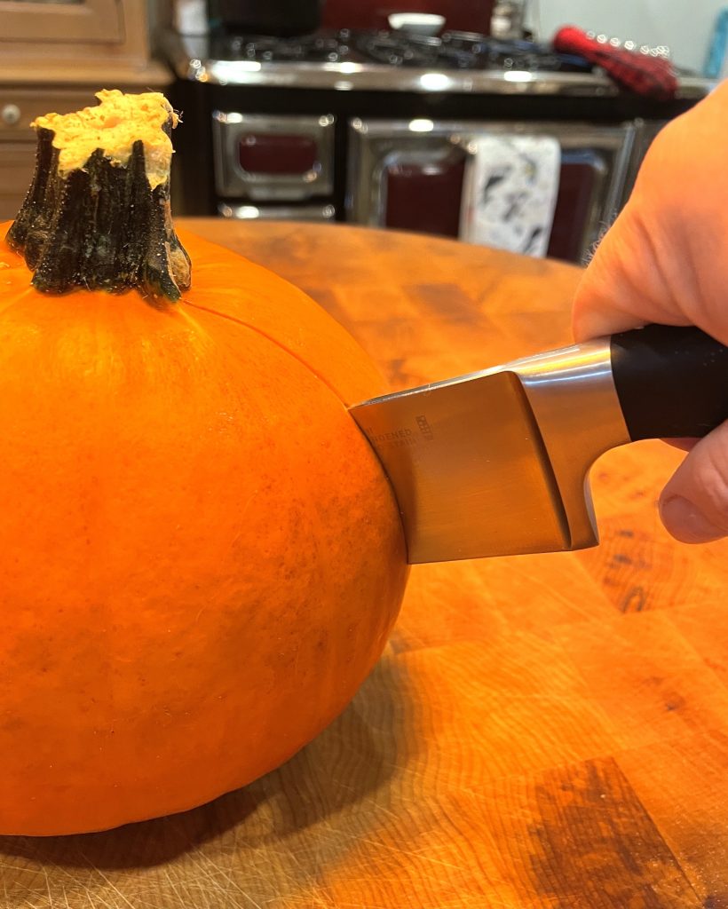 cutting a pie pumpkin for pumpkin season